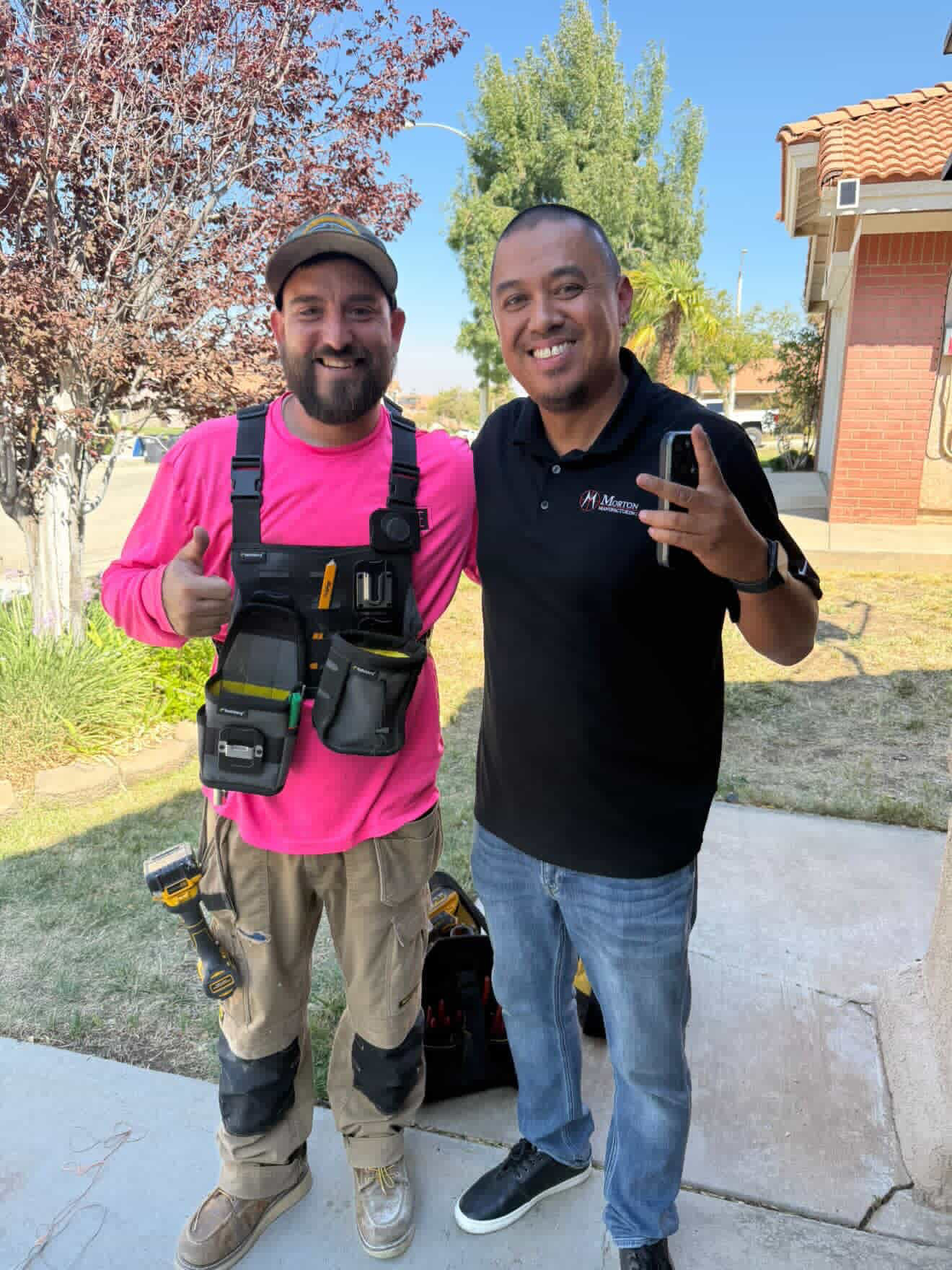Vibe Solar technician with customer